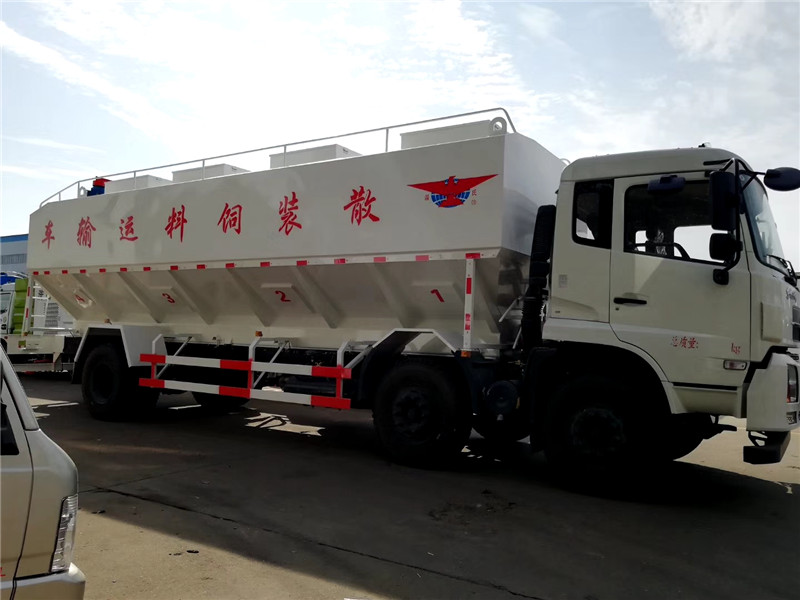 東風(fēng)天龍前四后八散裝飼料運輸車可獨立控制各分倉卸料順序和速度